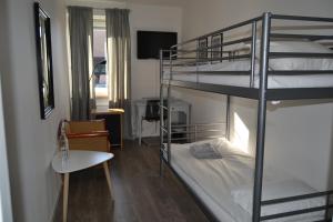 Postel nebo postele na pokoji v ubytování Solsta Hotell