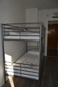 Postel nebo postele na pokoji v ubytování Solsta Hotell