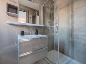 a bathroom with a sink and a shower at COZY studio-flat in PACEVILLE in St. Julianʼs +37 photos