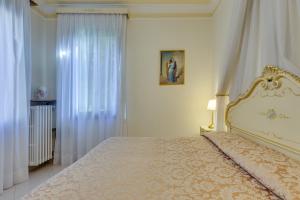 Postel nebo postele na pokoji v ubytování Hotel Bernardi Semenzato