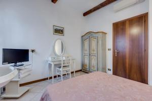 Postel nebo postele na pokoji v ubytování Hotel Bernardi Semenzato