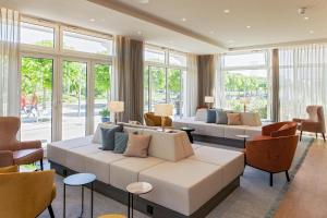 Posezení v ubytování SEETELHOTEL Ostseehotel das Entdeckerhotel an der Ostsee und der perfekte Startpunkt für Ihre Inselabenteuer