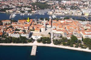 an aerial view of a city and the water at Exclusive Center Apartments in Zadar
