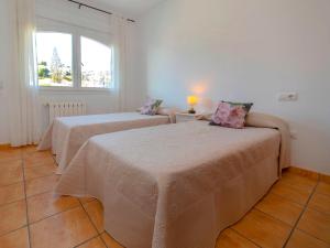 Posteľ alebo postele v izbe v ubytovaní Holiday Home Despacito by Interhome