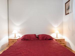 Gulta vai gultas numurā naktsmītnē Apartment Résidence Villa Cassandre by Interhome