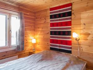 Postel nebo postele na pokoji v ubytování Holiday Home Ylläskuru d 2 by Interhome