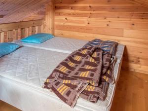Postel nebo postele na pokoji v ubytování Holiday Home Ylläskuru d 2 by Interhome