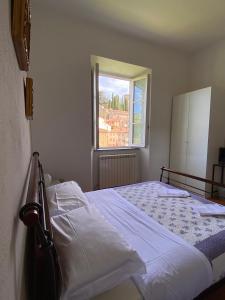 Postel nebo postele na pokoji v ubytování Villa Gherardi - B&B e Hostel