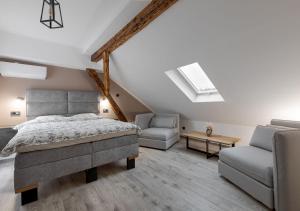 Posteľ alebo postele v izbe v ubytovaní Apartman DOWNTOWN DL