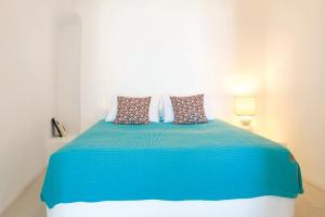 Voodi või voodid majutusasutuse Remezzo Villas toas