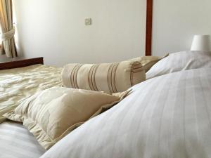 Postel nebo postele na pokoji v ubytování B&B OPG Culig