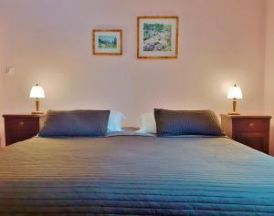 Posteľ alebo postele v izbe v ubytovaní Cà Gennara Agri B&B