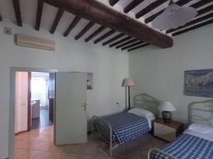 Posteľ alebo postele v izbe v ubytovaní Residence B&B il Connubio