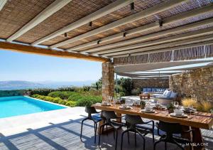 Bazén v ubytování M - Mykonos Villas nebo v jeho okolí + 22 fotografií
