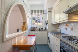 Kuchyň nebo kuchyňský kout v ubytování Apartment ElDoMar