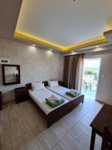 Postel nebo postele na pokoji v ubytování Abella Hotel