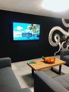 TV a/nebo společenská místnost v ubytování Villa 8 Islas