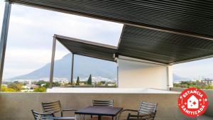 En balkon eller terrasse på ECONOSUITES FUNDIDORA