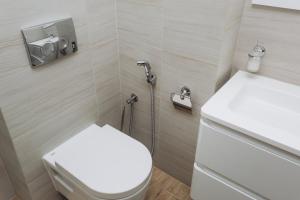 Kúpeľňa v ubytovaní VIP Flat lavina проспект М Лушпи 2 корп2