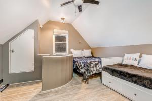 a bedroom with two beds and a ceiling fan at Park City Bliss in Park City