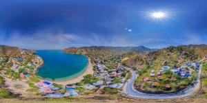 an aerial view of a resort next to a beach at Hotel Cactus Taganga in Taganga