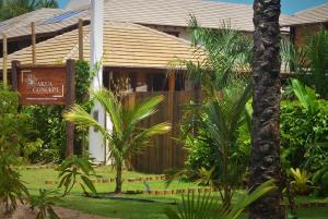 a resort with a sign in front of a building at Akua Concept - Taipu de Fora in Marau