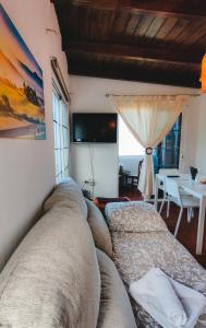 TV a/nebo společenská místnost v ubytování Apartamento Casa de Valentina