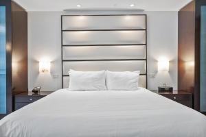 Voodi või voodid majutusasutuse Junior Suite at Sorrento Residences- FontaineBleau Miami Beach home toas