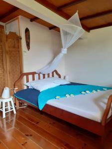 Ein Bett oder Betten in einem Zimmer der Unterkunft RESIDENCE LA TAUPINE MANDARINE