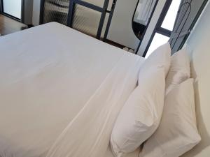 Postel nebo postele na pokoji v ubytování Wonderwall Hotel