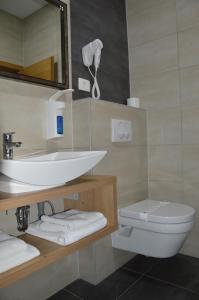 Koupelna v ubytování Hotel Slovenj Gradec