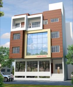 a rendering of a modern building at Hotel Madhuri Executive in Kolhapur