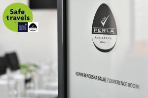 Certifikát, hodnocení, plakát nebo jiný dokument vystavený v ubytování Perla Residence Hotel & SPA