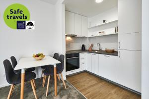 Kuchyň nebo kuchyňský kout v ubytování Perla Residence Hotel & SPA