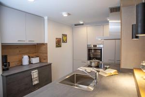 Küche/Küchenzeile in der Unterkunft Familien & Ferien Wohnung by Holzbau Keller