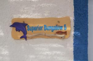 a sign on the side of a building at Summer Residence in Provatas