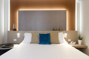 Voodi või voodid majutusasutuse Seawater Hotel Bio & Beauty Spa toas