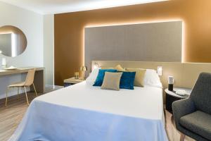 Voodi või voodid majutusasutuse Seawater Hotel Bio & Beauty Spa toas