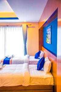 Krevet ili kreveti u jedinici u objektu Himalayan Suite Hotel