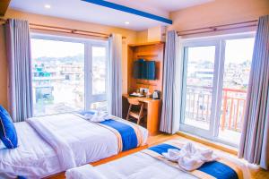 Krevet ili kreveti u jedinici u objektu Himalayan Suite Hotel