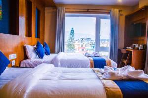 Krevet ili kreveti u jedinici u objektu Himalayan Suite Hotel