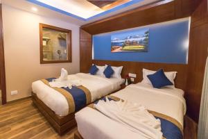 Krevet ili kreveti u jedinici u objektu Himalayan Suite Hotel