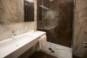 Koupelna v ubytování Hotel Concord