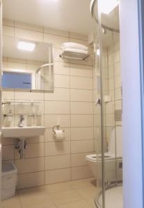 Koupelna v ubytování Hotel Garni Villa Areka