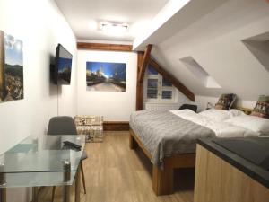 Postel nebo postele na pokoji v ubytování Hotel Garni Villa Areka