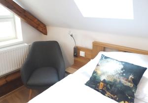 Postel nebo postele na pokoji v ubytování Hotel Garni Villa Areka