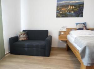 Postel nebo postele na pokoji v ubytování Hotel Garni Villa Areka