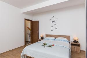 Posteľ alebo postele v izbe v ubytovaní Apartment Manuela