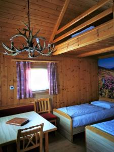 A bed or beds in a room at Ferienpark Gaal
