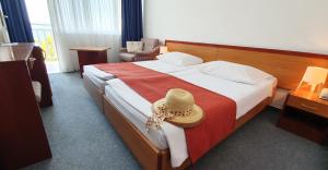 Postel nebo postele na pokoji v ubytování Sagitta All inclusive light